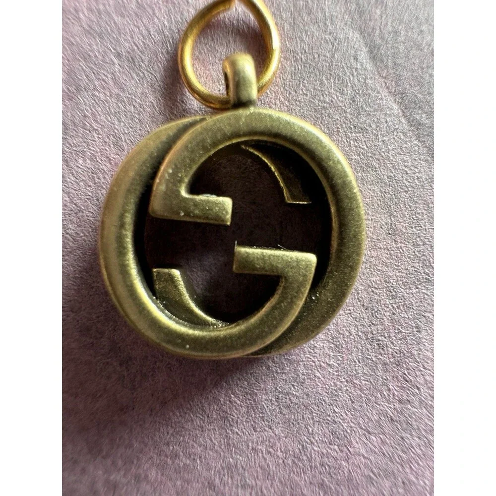 Gucci zipper pull/pendant gold tone